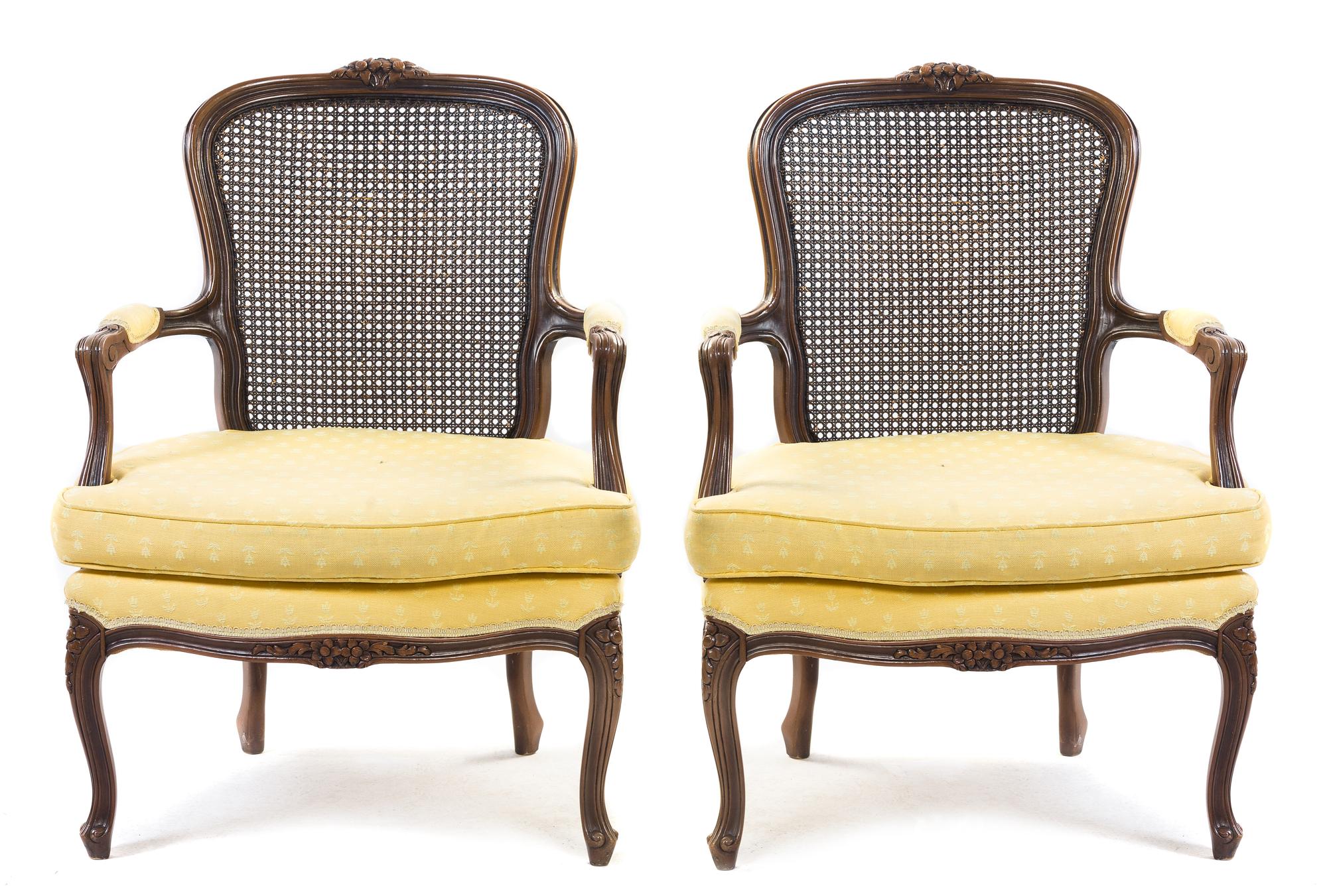 A Pair of Louis XV Style Walnut Fauteuils Height 37 inches.