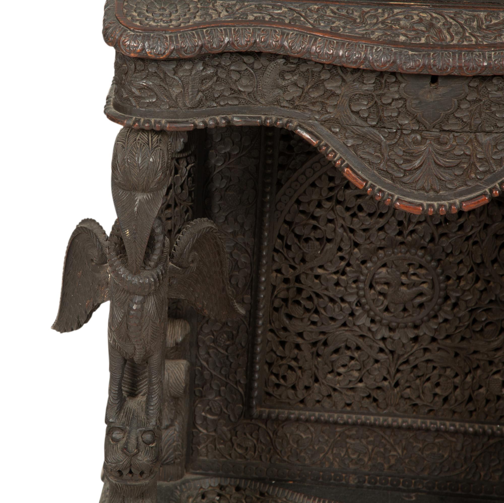 An Anglo-Burmese Carved Teak Davenport Desk