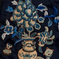 Two Chinese Midnight-Blue Ground Embroidered Silk Lady's Robes, 19th Century 清晚期 石青地綉花女褂兩件