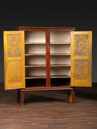 A Country Grain Painted Pine and Pressed Sheet Tin Pie Safe and Marriage Cabinet
