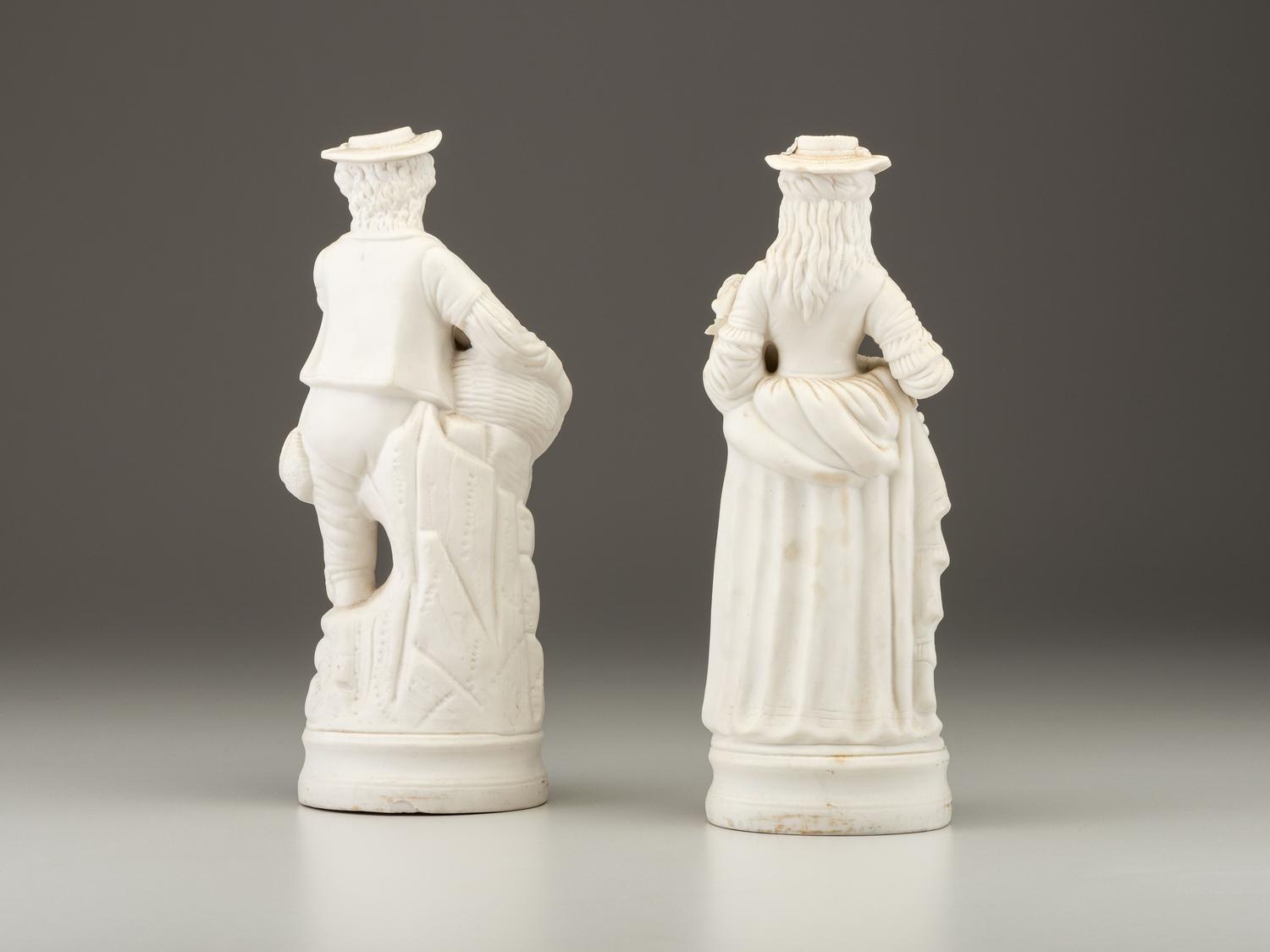A Pair of Bisque Porcelain Figures