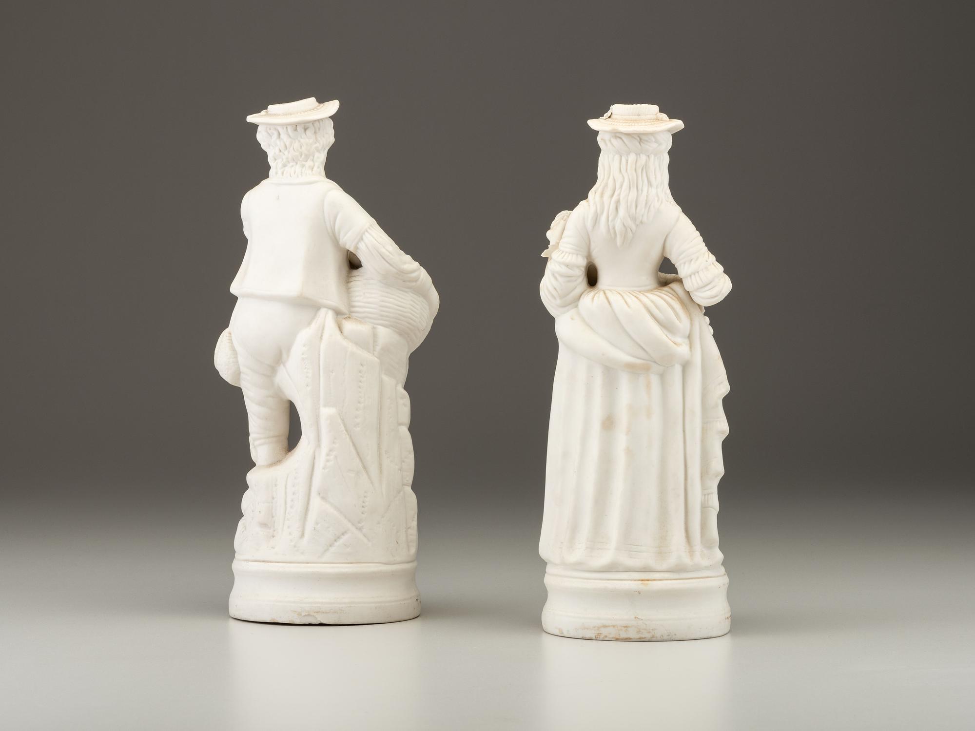 A Pair of Bisque Porcelain Figures