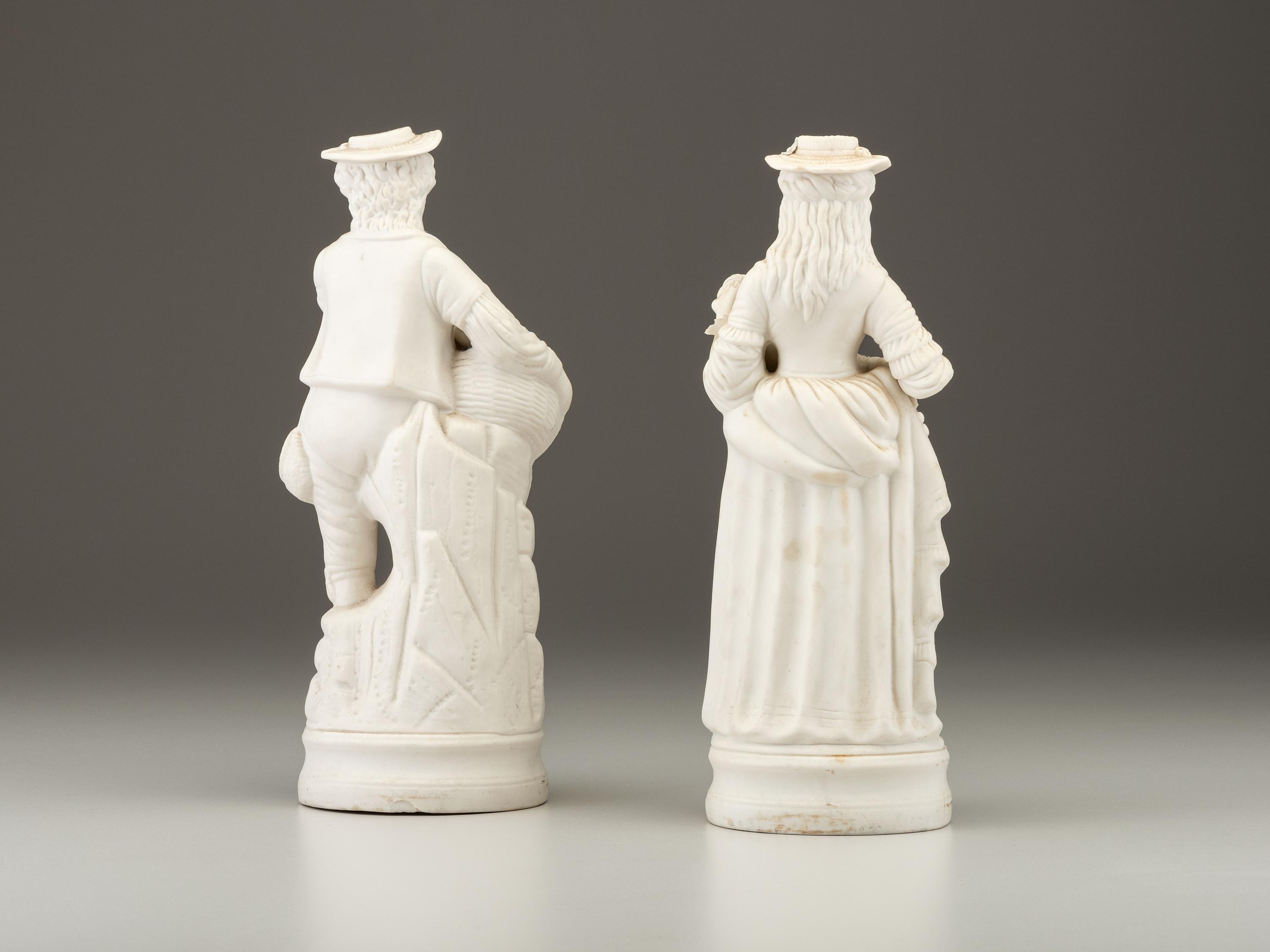 A Pair of Bisque Porcelain Figures