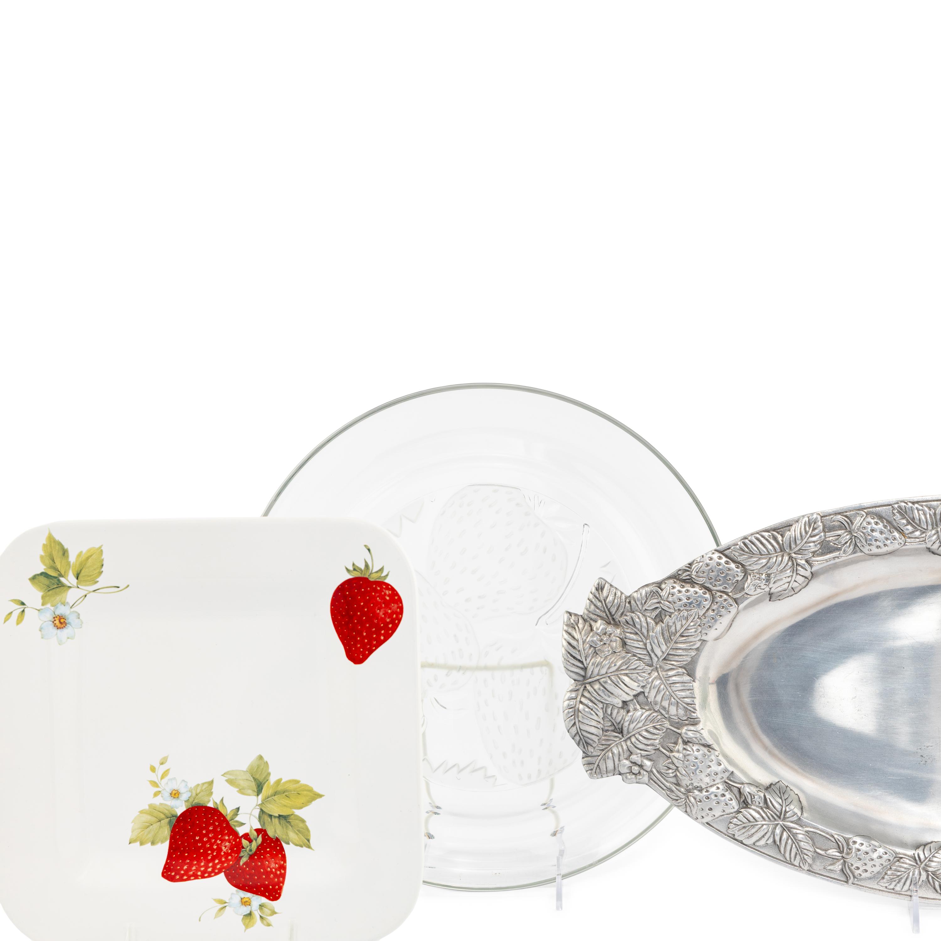 A Group of Strawberry Themed Serving Platters