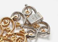 A Three-Tone Rose, White, and Yellow Gold and Multicolor Diamond Bracelet