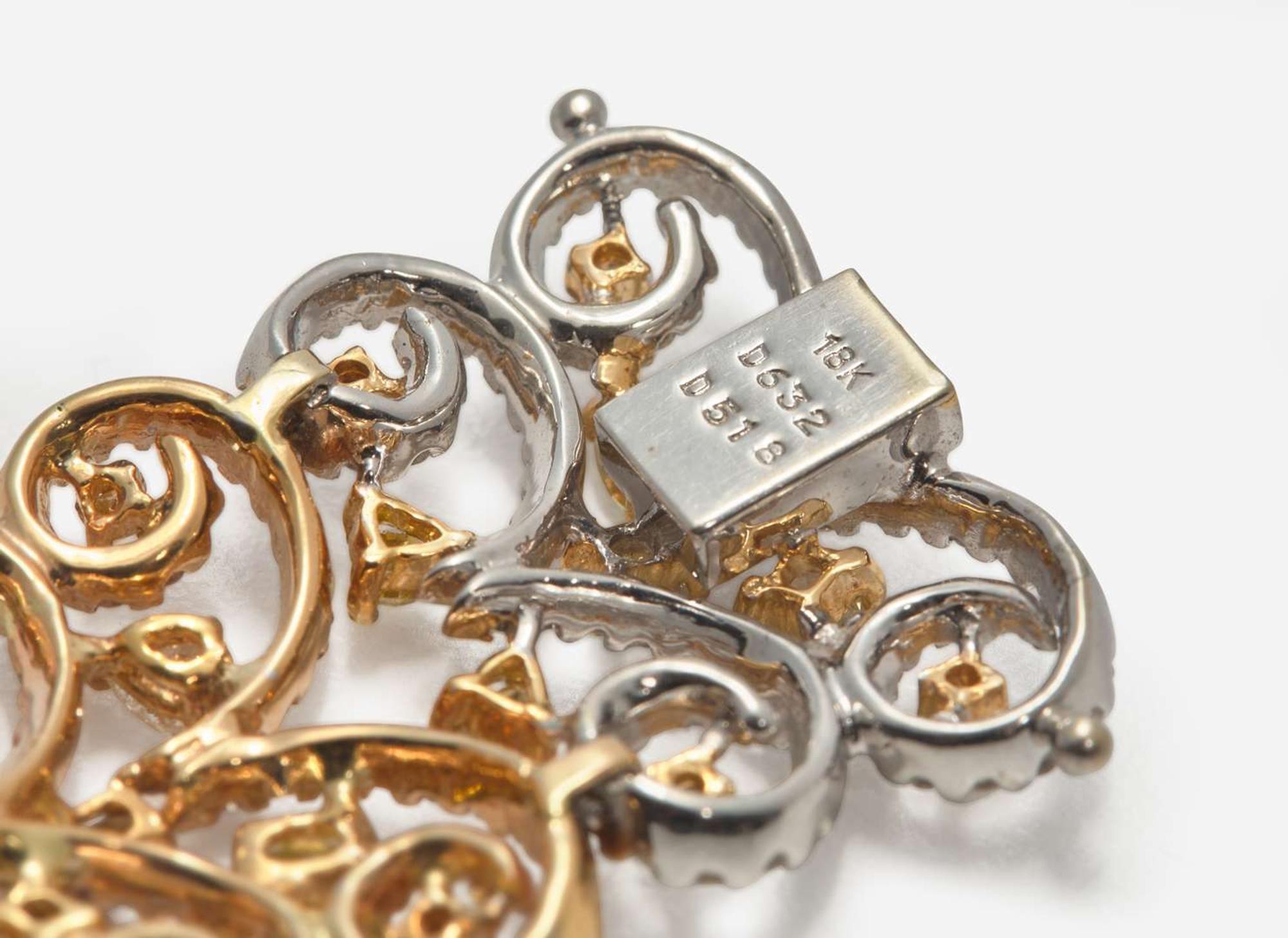 A Three-Tone Rose, White, and Yellow Gold and Multicolor Diamond Bracelet