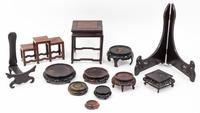 A Collection of Thirty-Four Hardwood Stands.