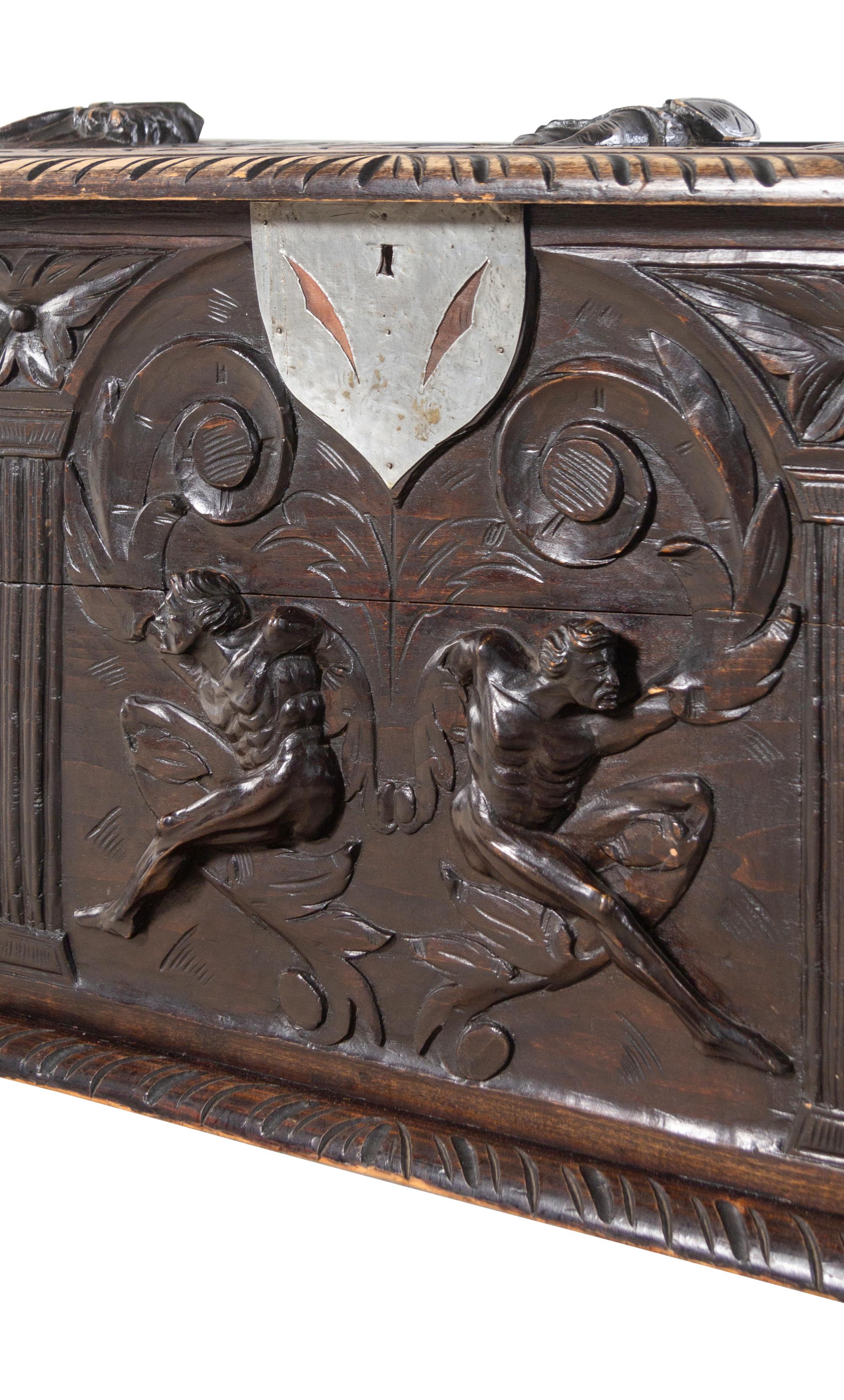 A Renaissance Revival Carved Walnut Chest