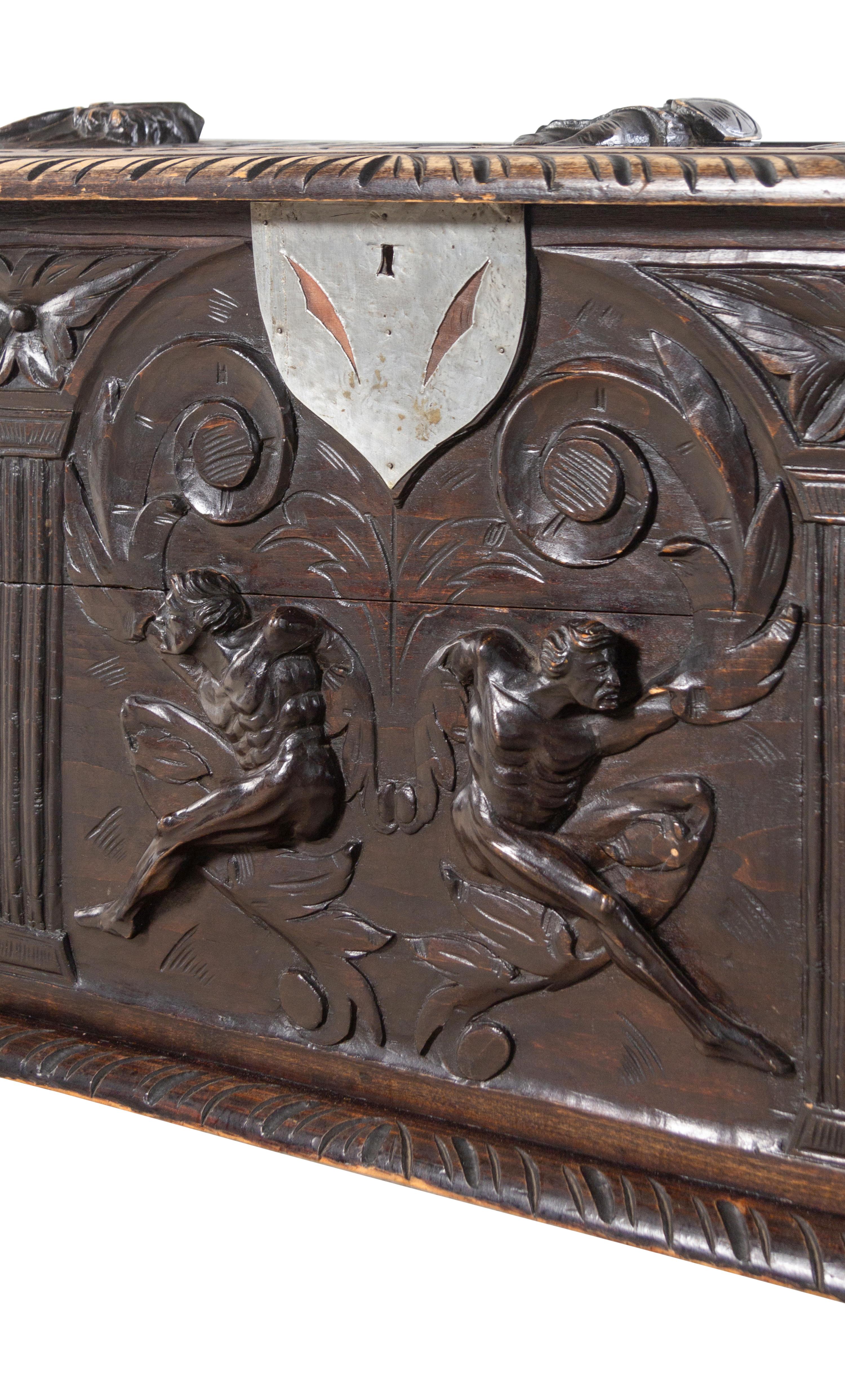 A Renaissance Revival Carved Walnut Chest