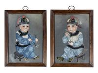 A Pair of Chinese Reverse-Painted Glass Pictures