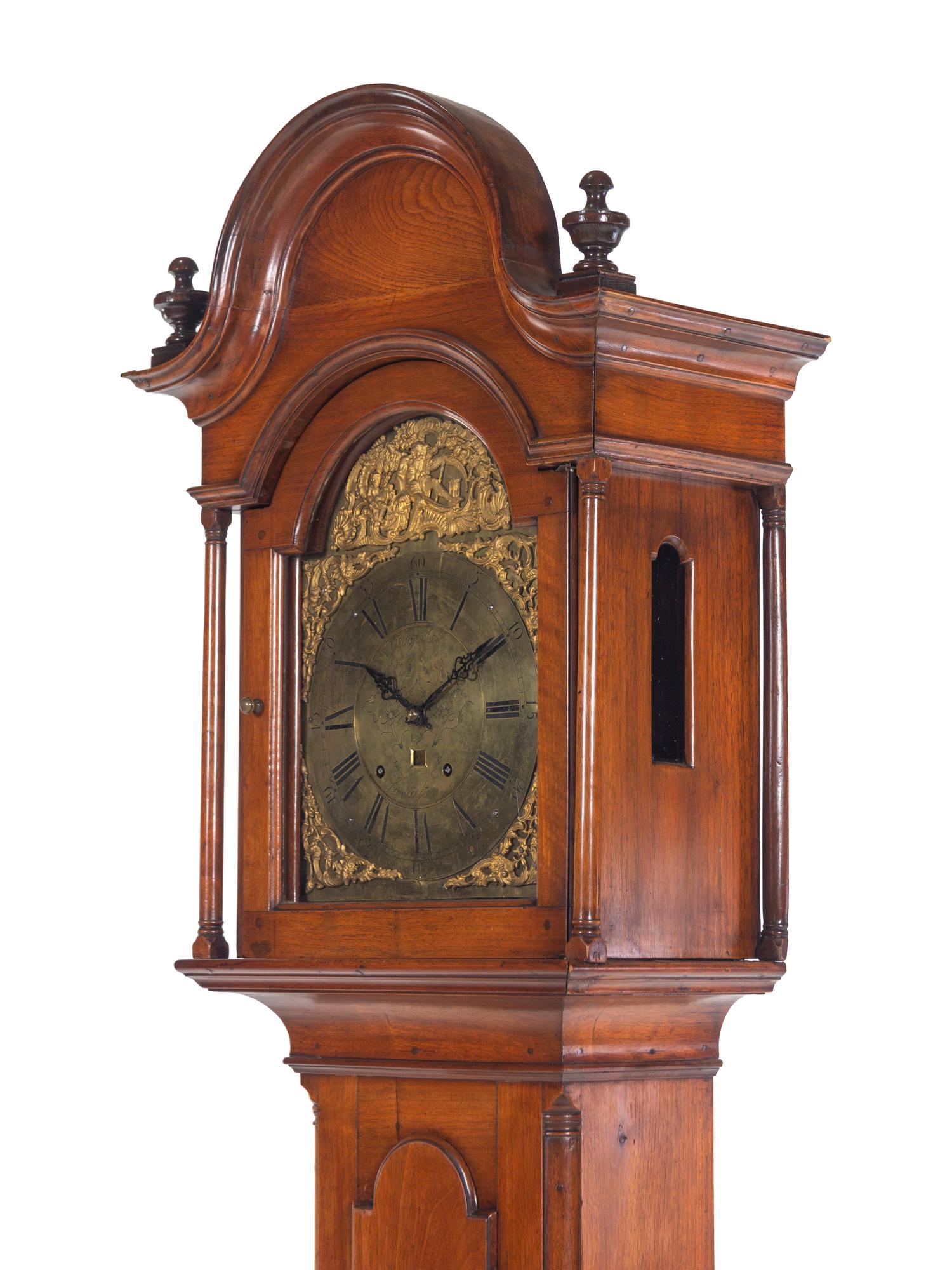 A Queen Anne Walnut Tall Case Clock