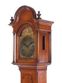 A Queen Anne Walnut Tall Case Clock