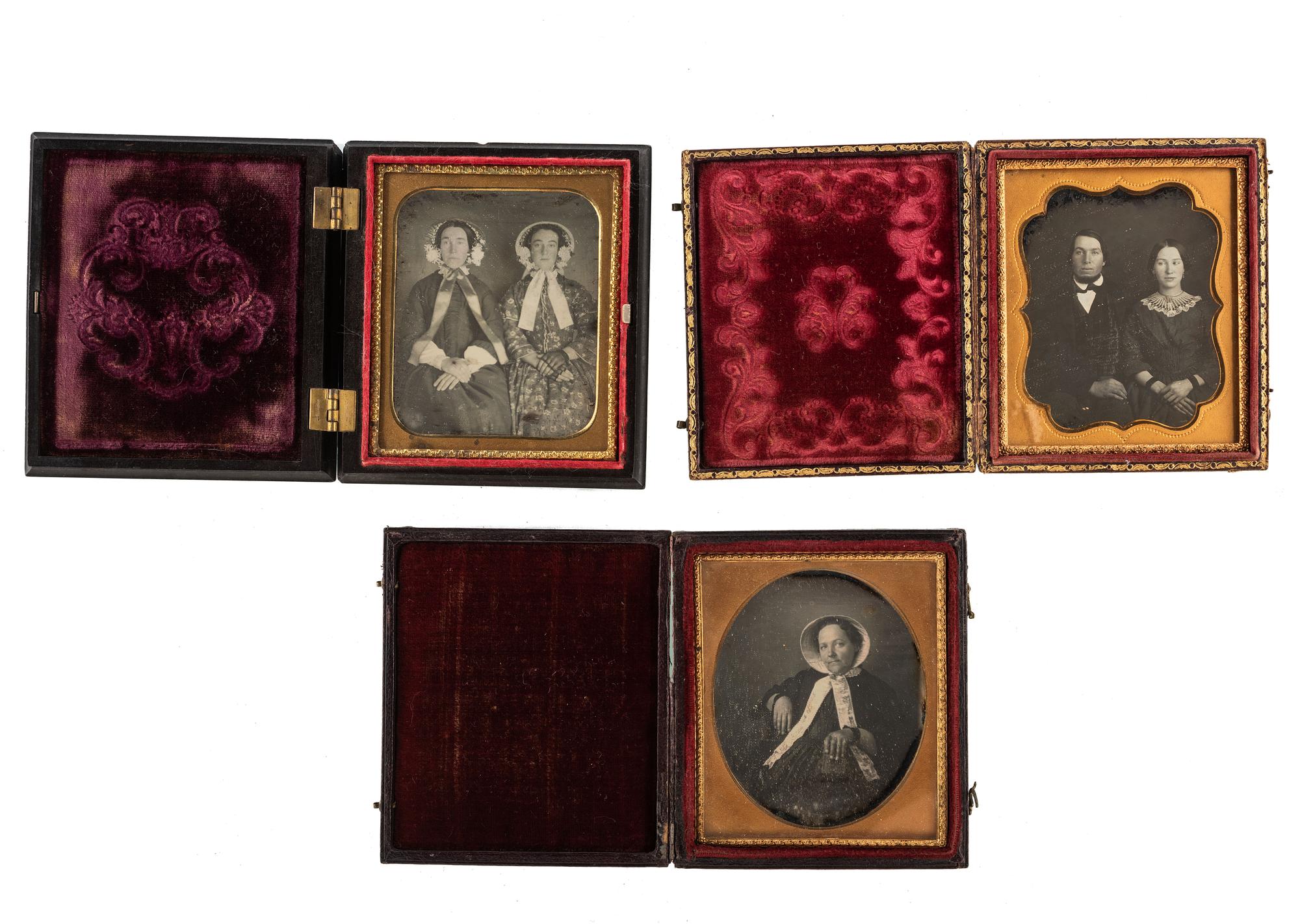 [EARLY PHOTOGRAPHY - PORTRAITURE]. A group of 7 daguerreotype portraits of men and women including several couples.