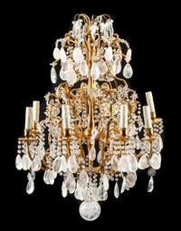 A French Gilt Bronze and Rock Crystal Eight-Light Chandelier Height 34 x diameter 23 inches. — 19TH CENTURY