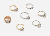 An Assorted Collection of Gold and Diamond Rings