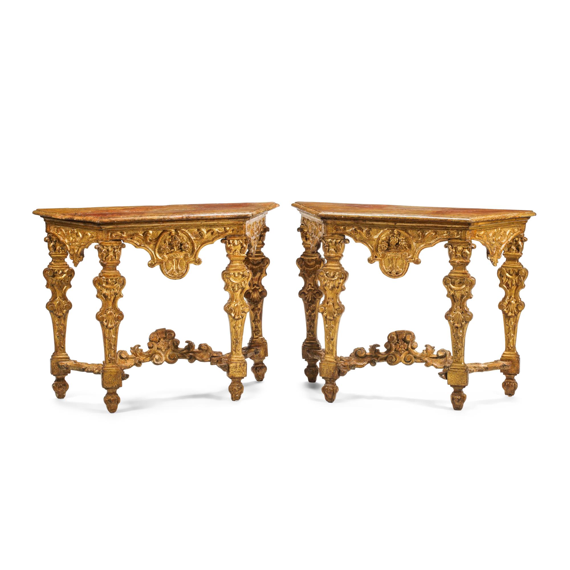 A Pair of Italian Baroque Carved Giltwood Console Tables