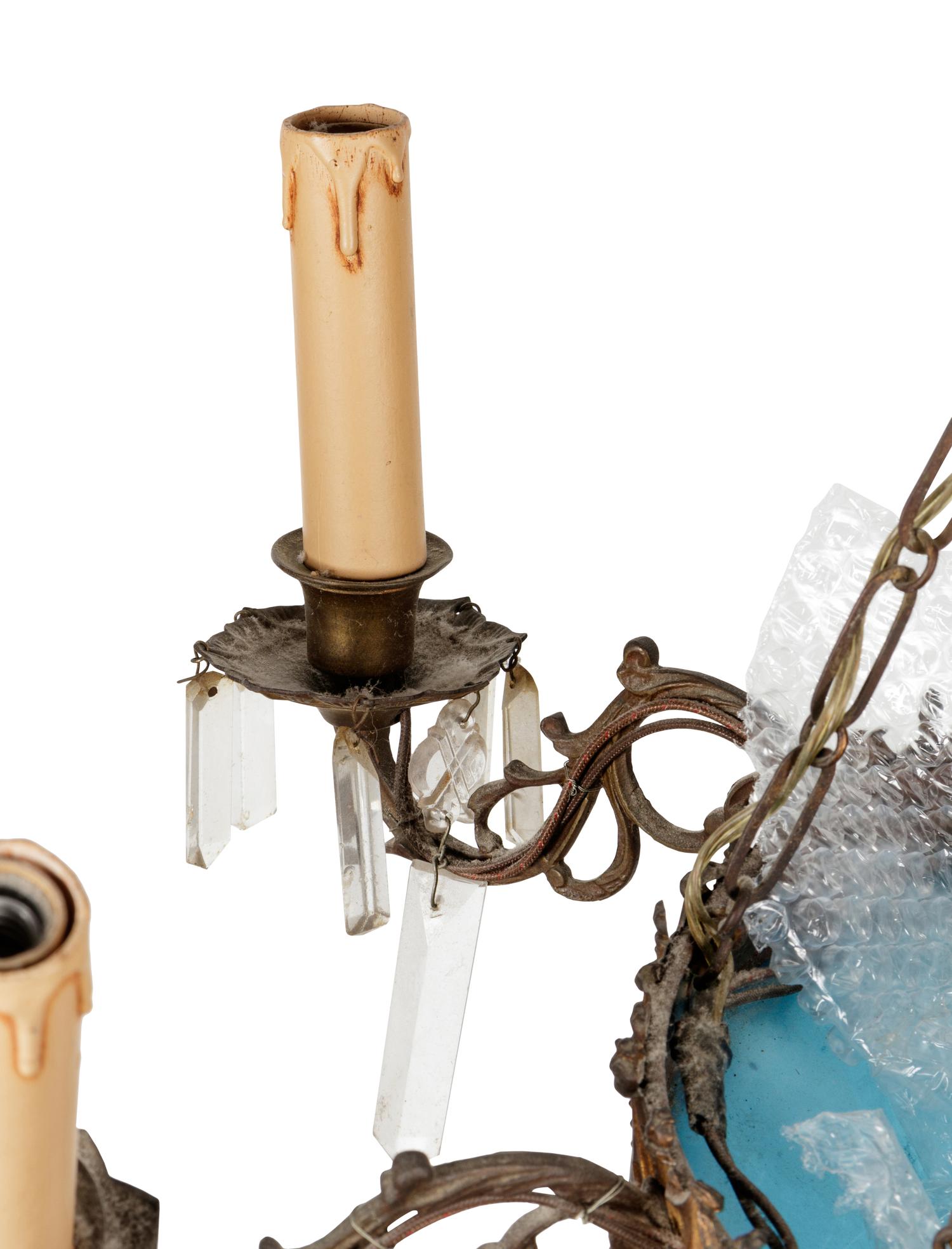 A Gilt Metal Mounted Opaline Glass Six-Light Chandelier