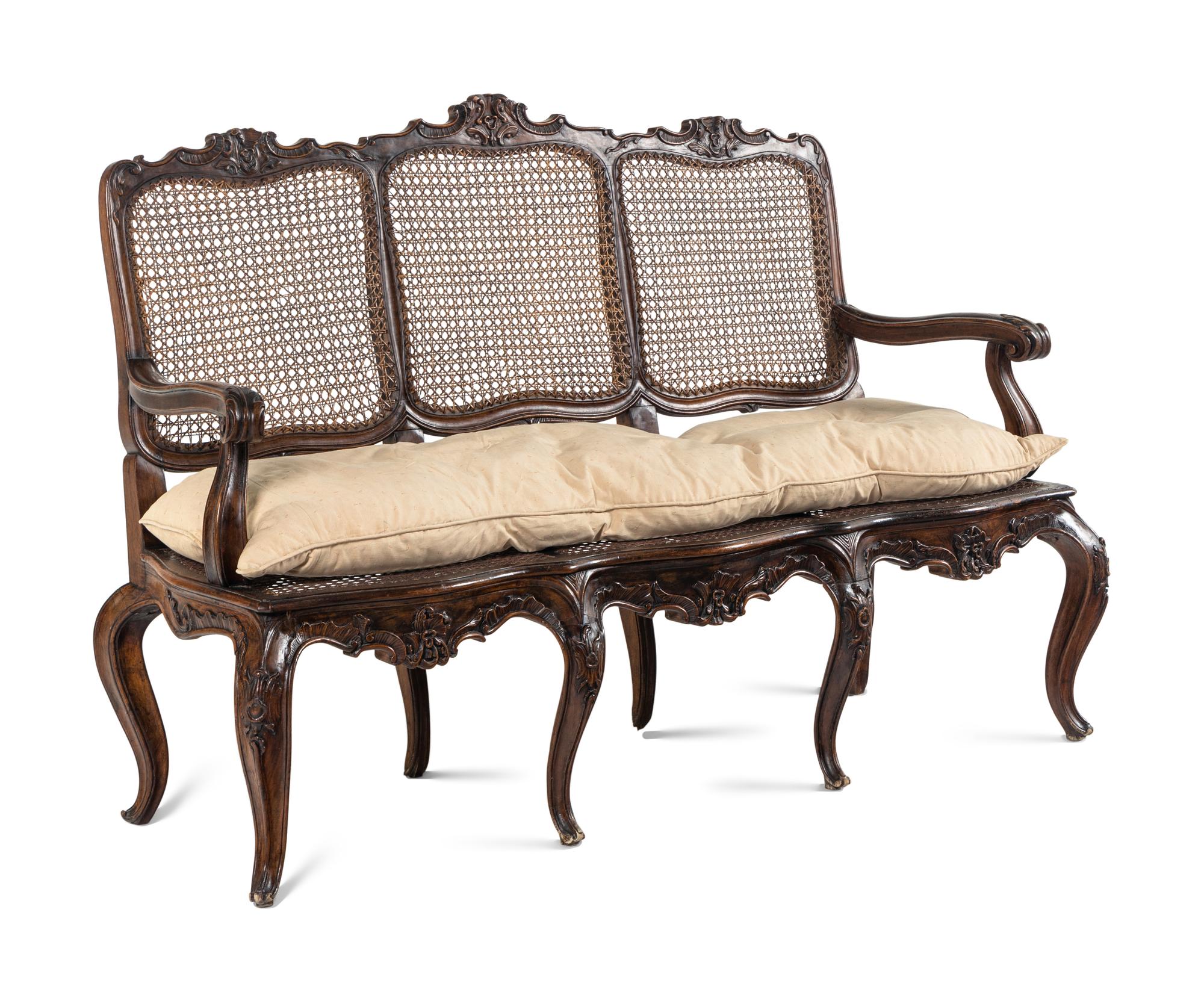An Italian Rococo Style Carved Walnut Settee