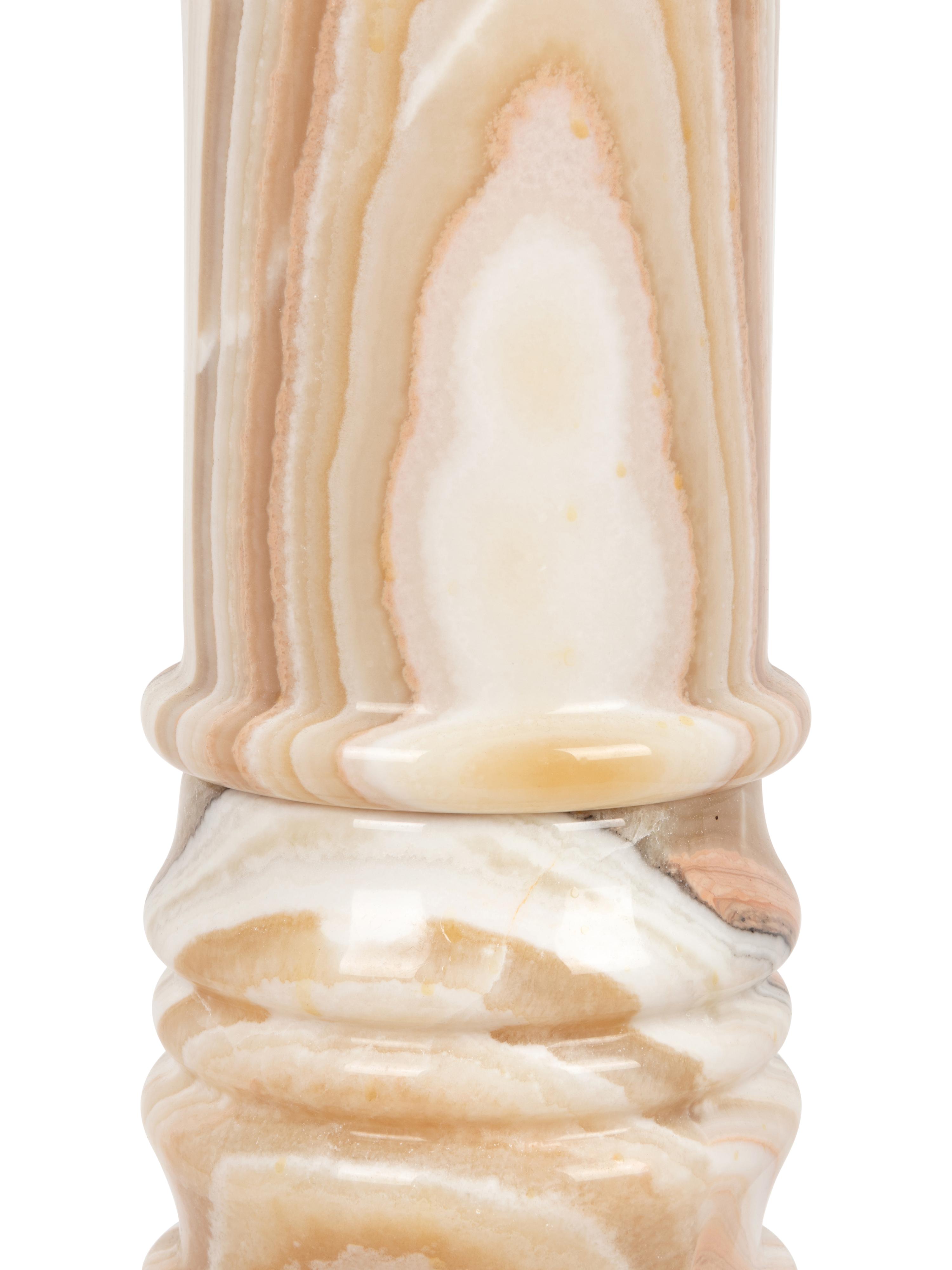 An Onyx Pedestal Base