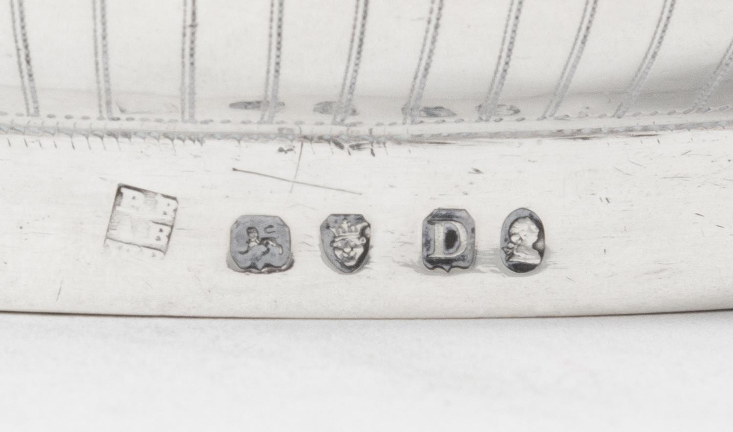 An English Silver Sugar, Peter, Ann & William Bateman, London, 1799, of oval, handled form.