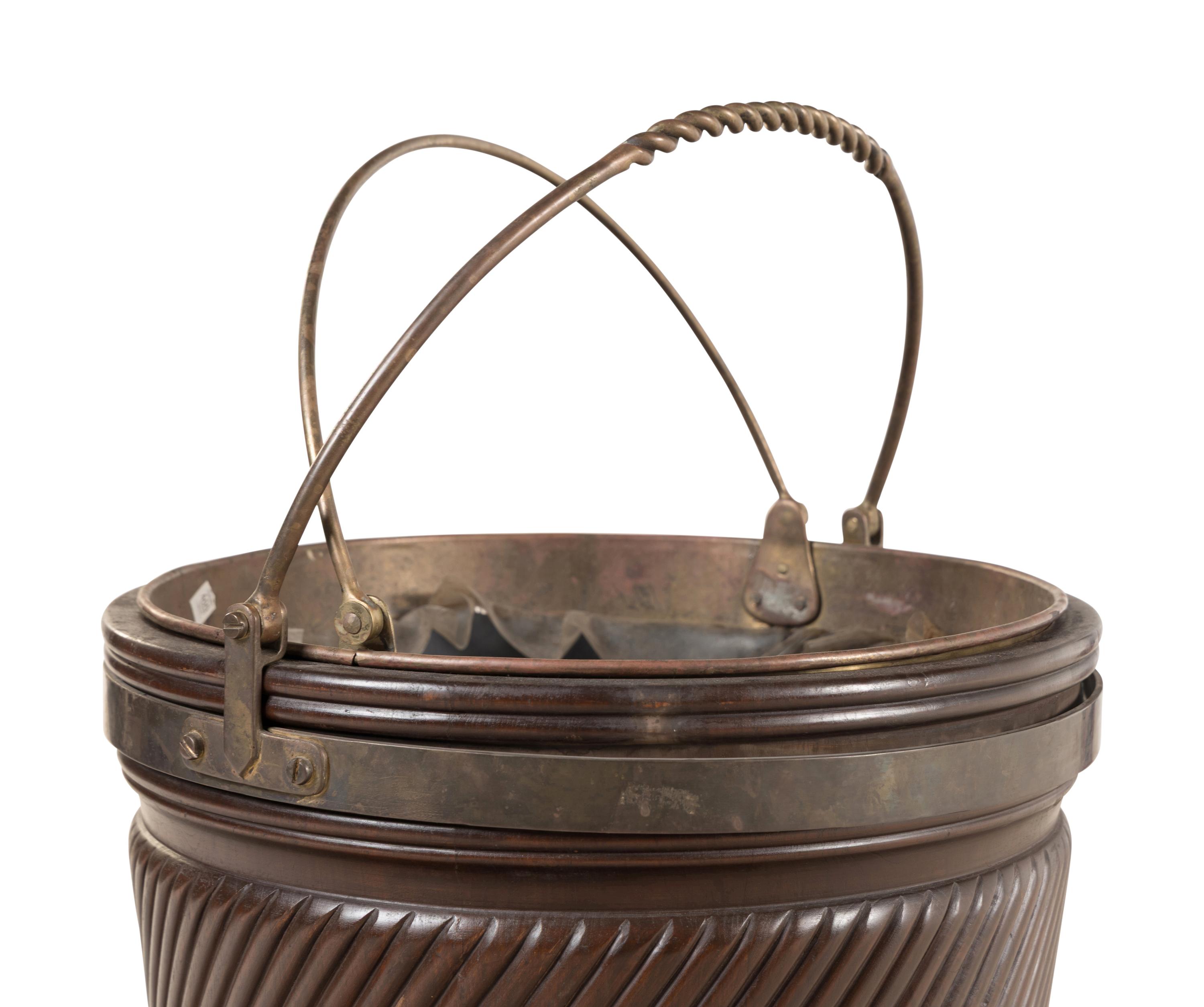 An Irish Regency Style Mahogany and Brass Bound Peat Bucket