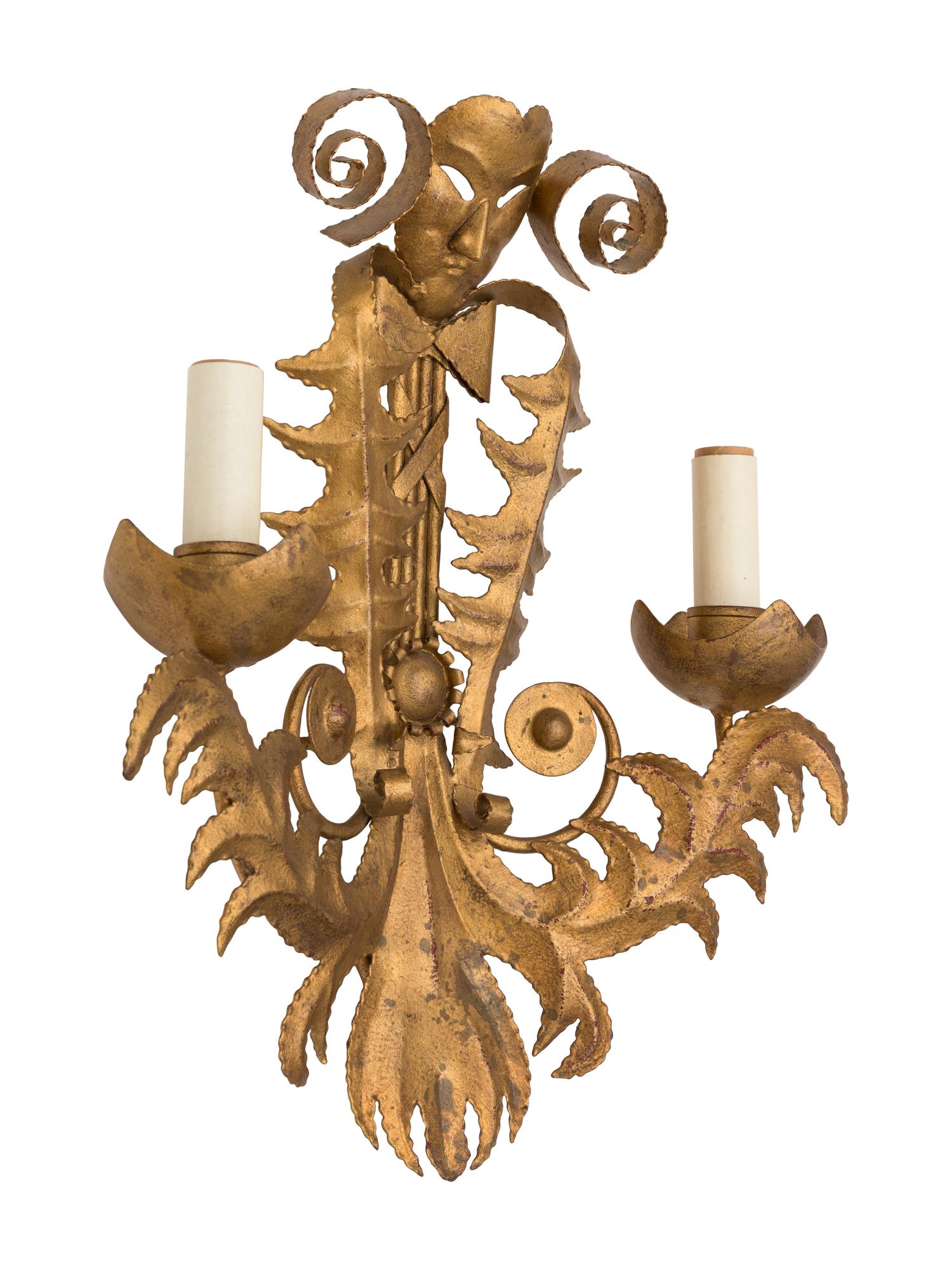 A Set of Four French Gilt Metal Two-Light Sconces