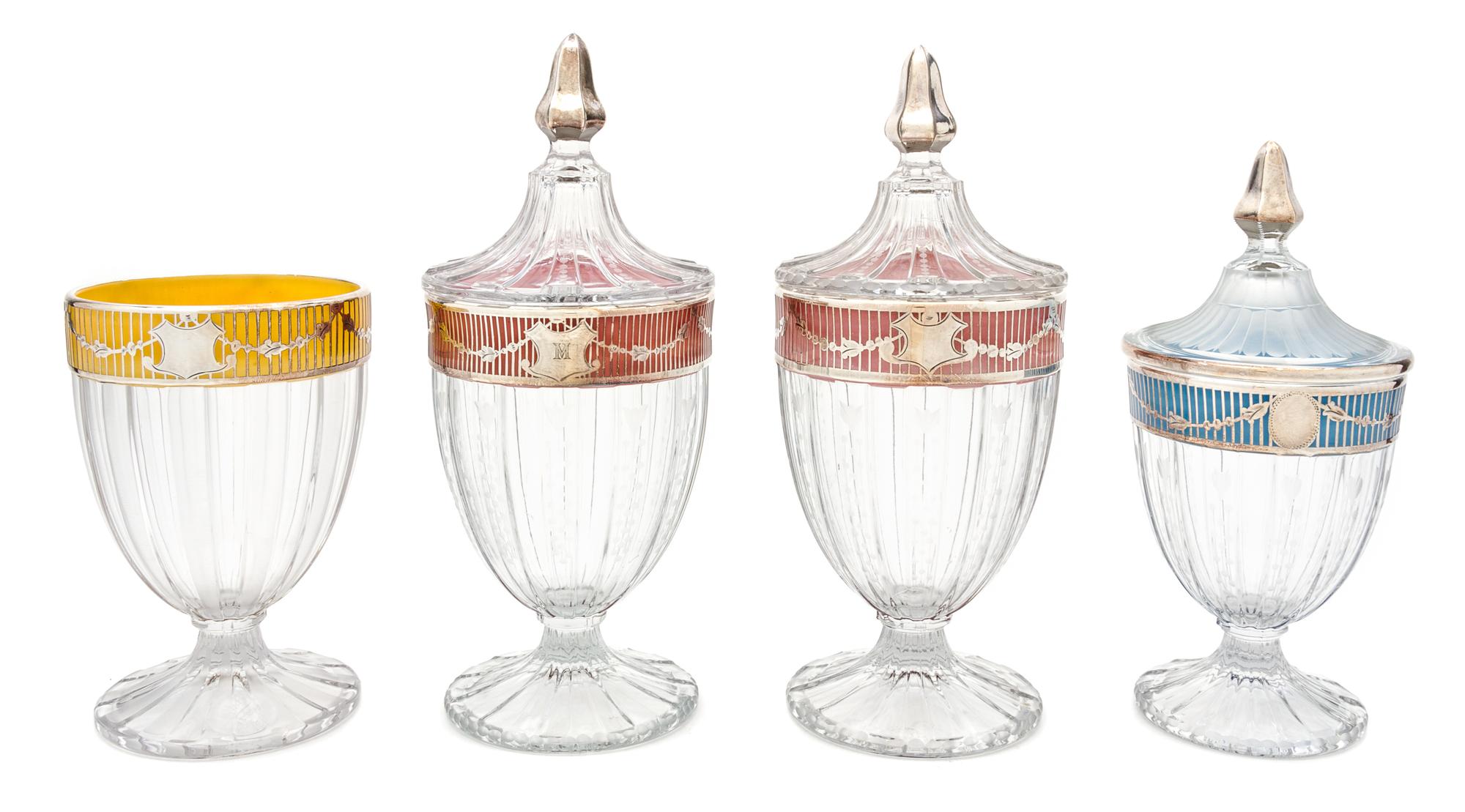 Four Heisey Silver Overlay Glass Covered Urns Height of tallest 10 3/8 inches.