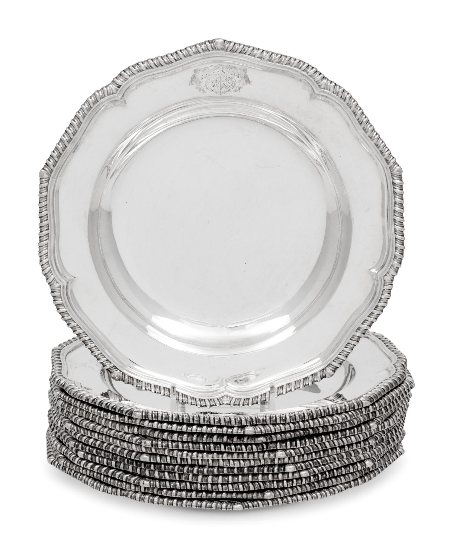 A Set of Twelve Silver Armorial Soup Plates