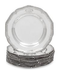 A Set of Twelve Silver Armorial Soup Plates