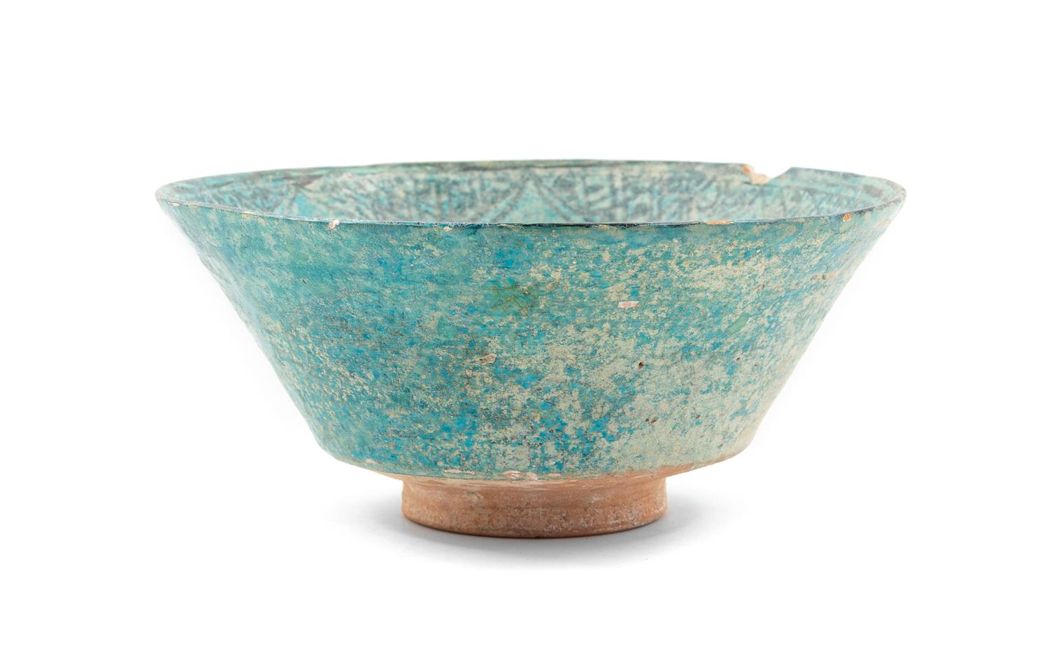 An Islamic Black and Blue Glazed Pottery Bowl Diameter 8 1/2 inches. — CIRCA 12TH CENTURY