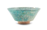An Islamic Black and Blue Glazed Pottery Bowl Diameter 8 1/2 inches. — CIRCA 12TH CENTURY