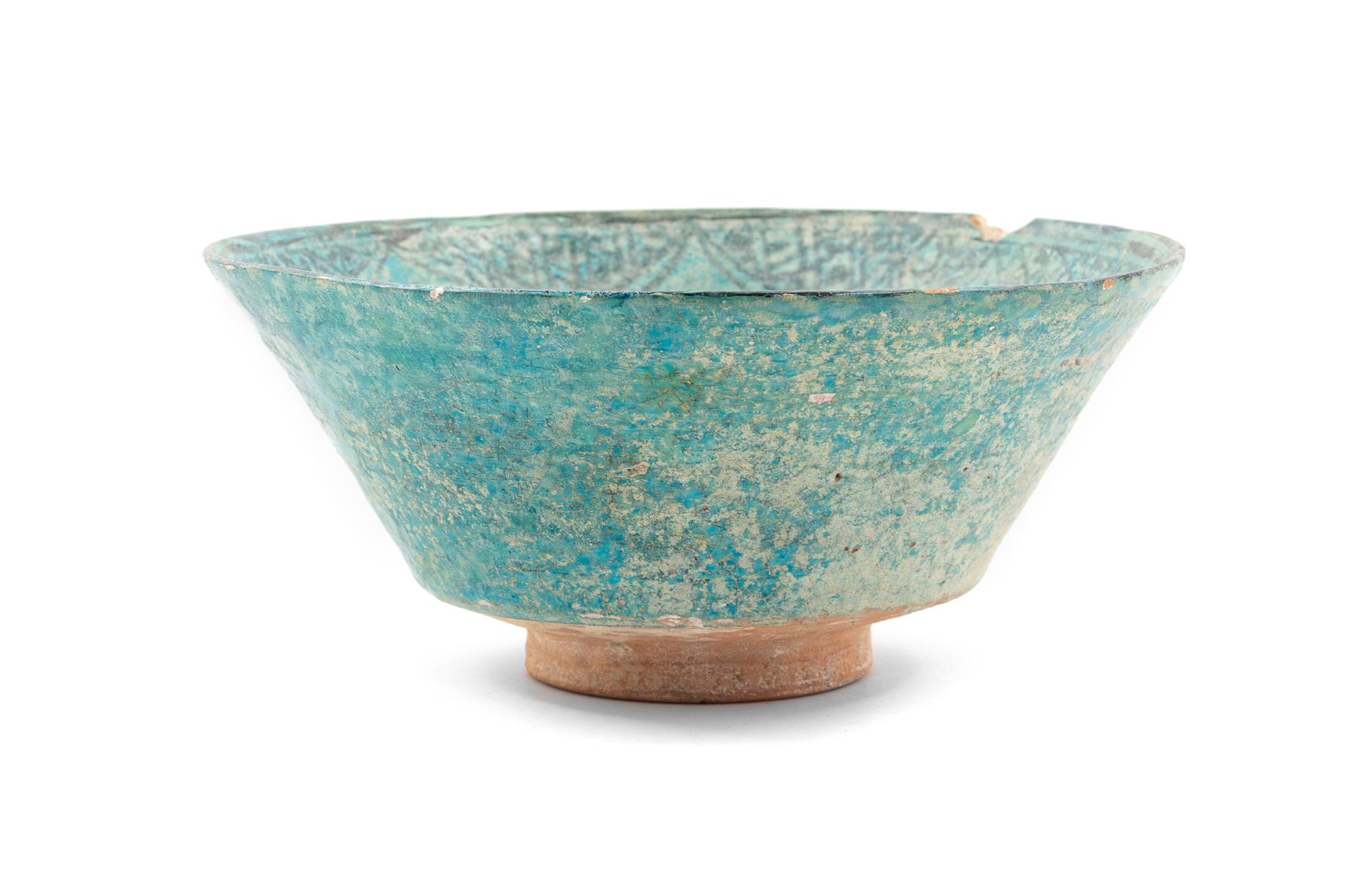 An Islamic Black and Blue Glazed Pottery Bowl Diameter 8 1/2 inches. — CIRCA 12TH CENTURY