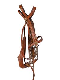 A Group of Western Horse Bridles and Quirts