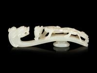 A White Jade 'Dragon' Belt Hook and A White Jade 'Double Happiness' Pendant