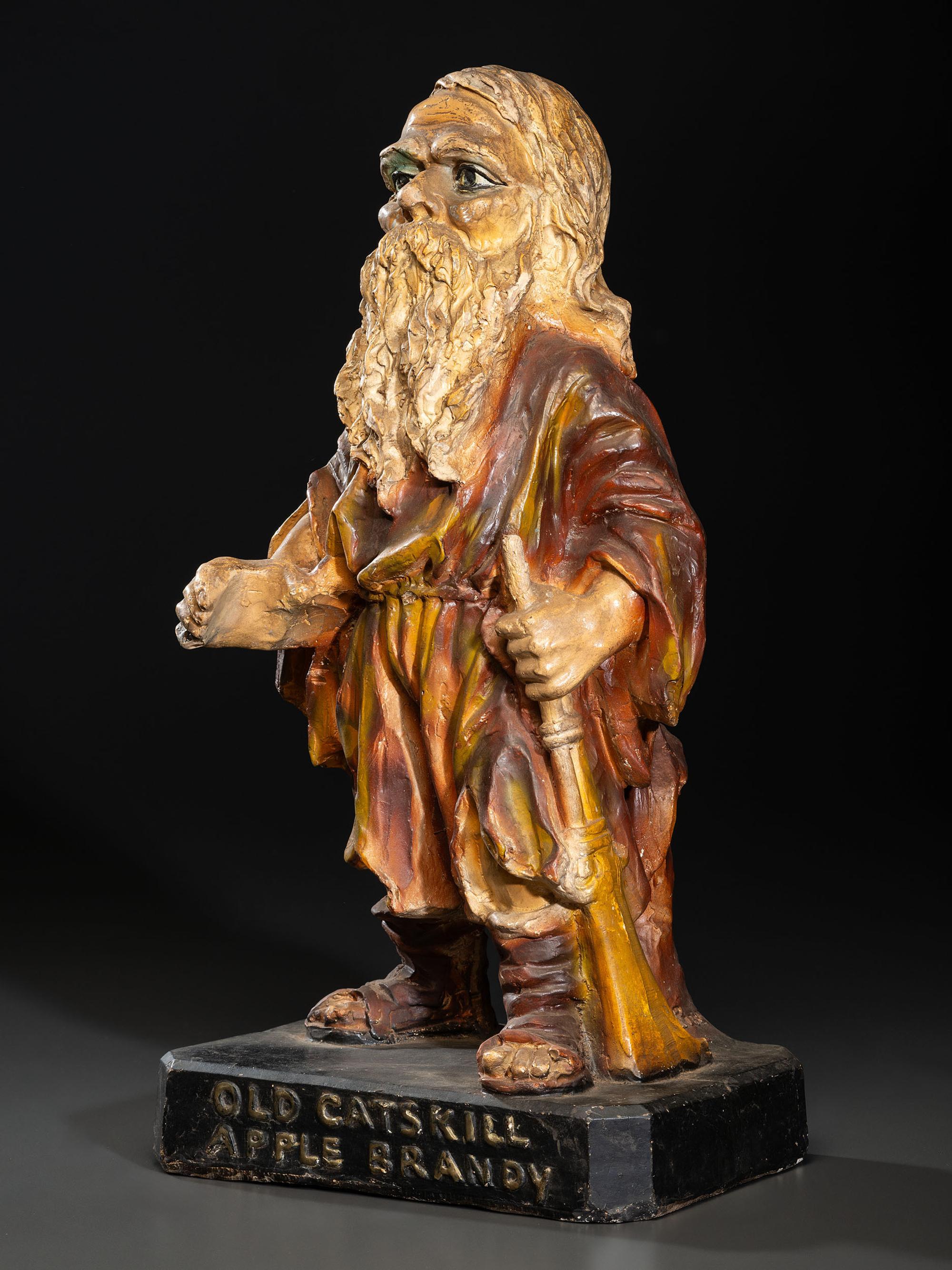 An 'Old Catskill' Apple Brandy Painted Chalkware Countertop Advertising Figure