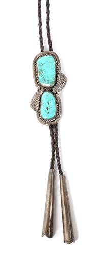 A Southwestern Silver and Turquoise Bolo Height 3 1/2 x width 2 3/4 inches.