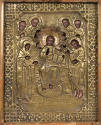 A Russian Pressed Brass Oklad Mounted Icon in Case