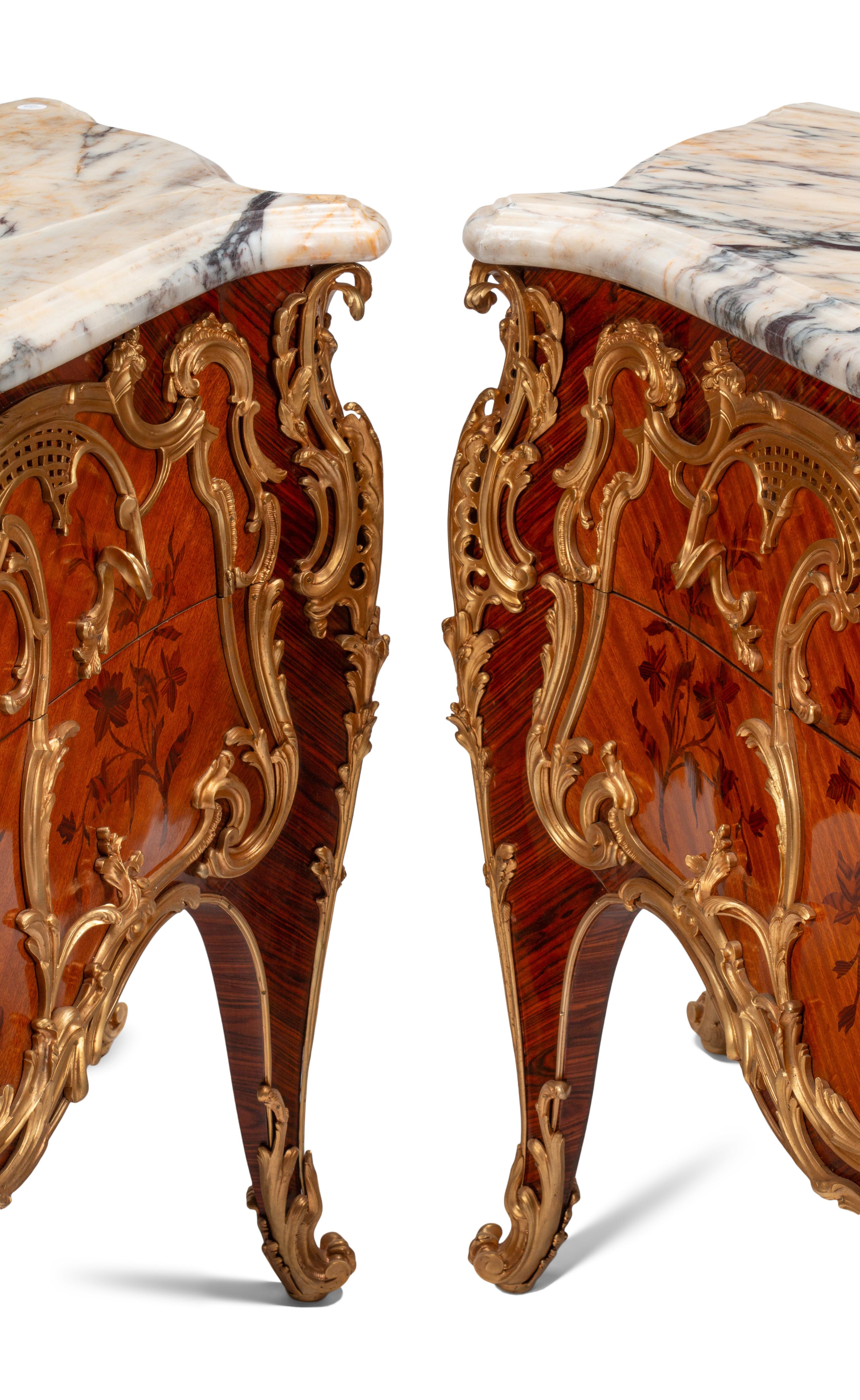 A Pair of Louis XV Style Gilt Bronze Mounted Marquetry Marble-Top Commodes