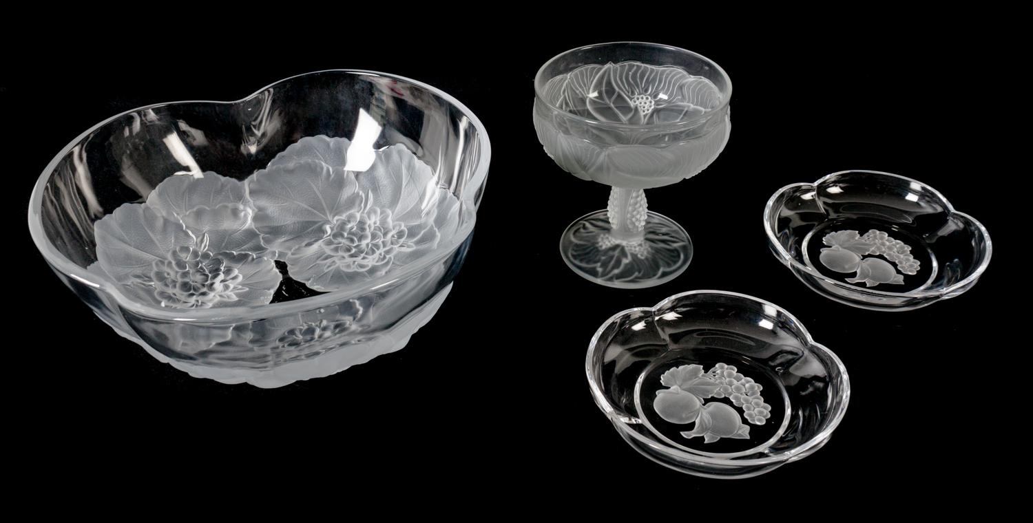 An Assembled Collection of Molded Clear and Frosted Glass Articles Diameter of largest 9 1/2 inches. — 20TH CENTURY