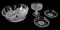 An Assembled Collection of Molded Clear and Frosted Glass Articles Diameter of largest 9 1/2 inches. — 20TH CENTURY