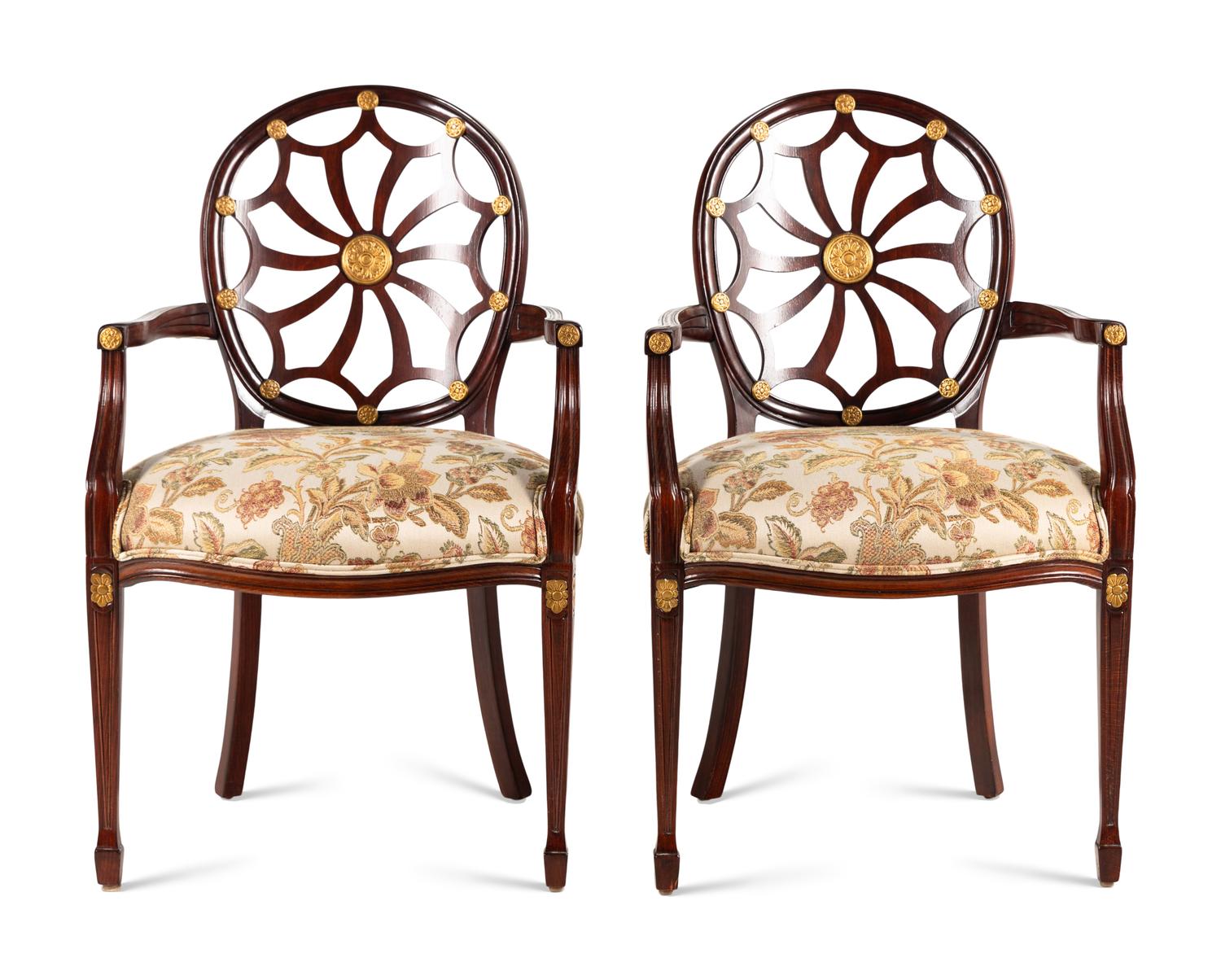 A Pair of George III Style Mahogany and Parcel-Gilt Armchairs