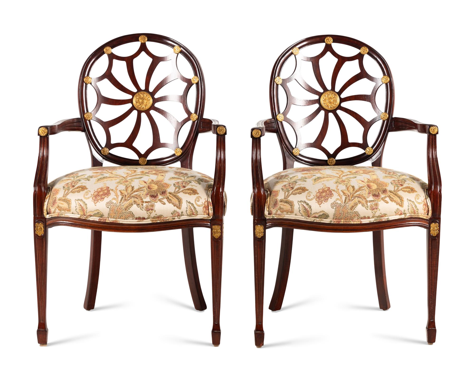 A Pair of George III Style Mahogany and Parcel-Gilt Armchairs