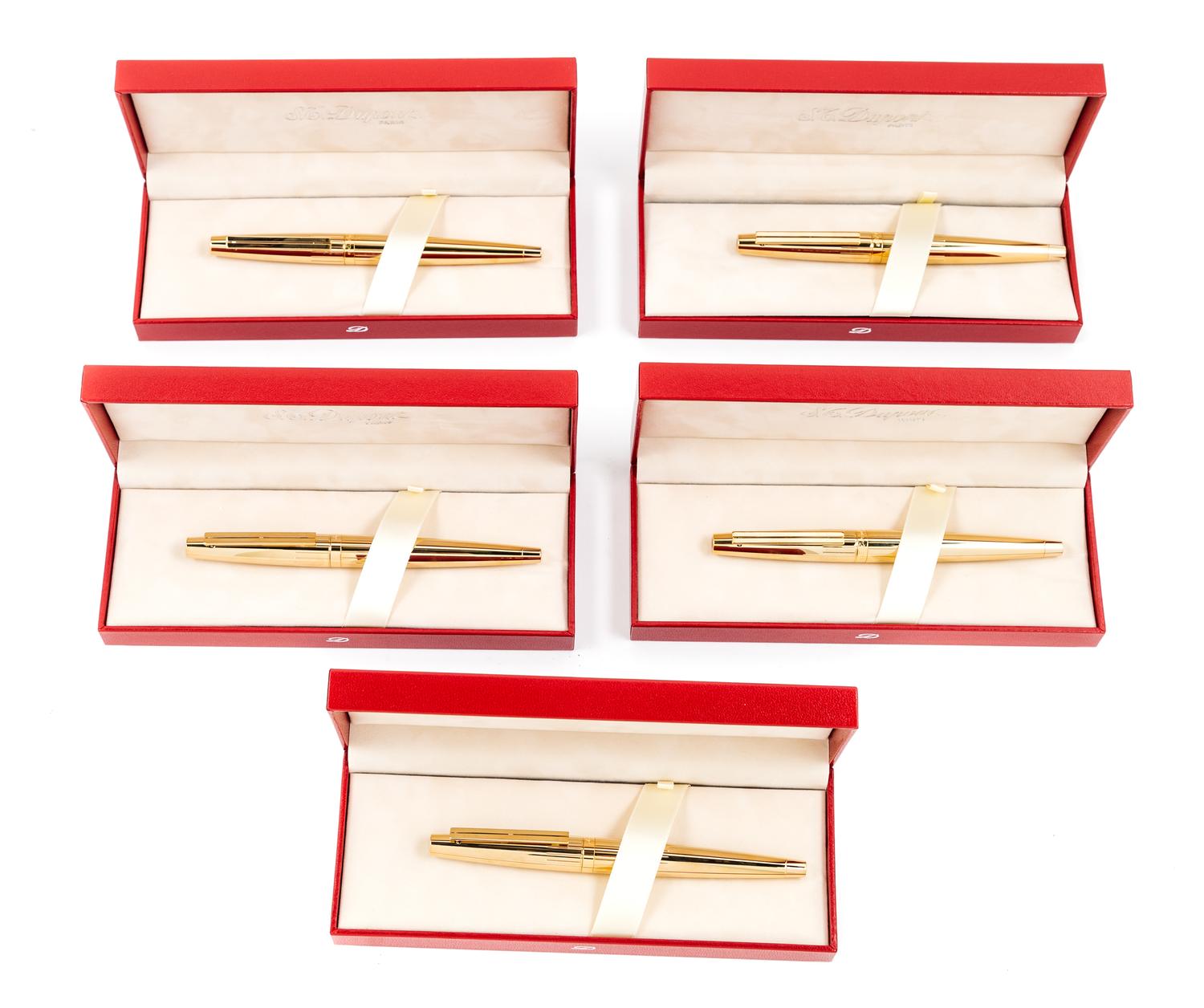 A Group of Five S.T. Dupont Gold-Plated Ellipsis Fountain Pens
