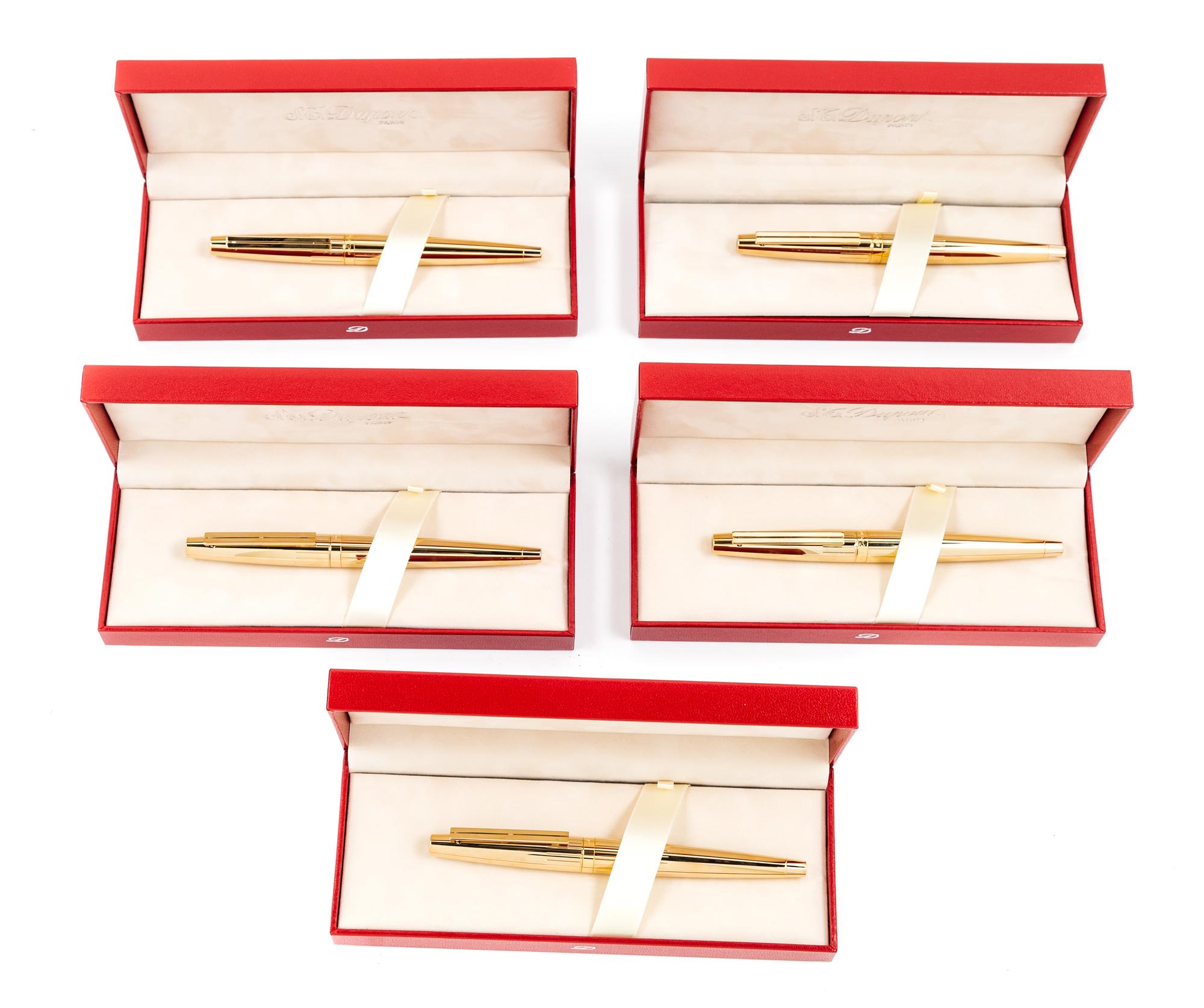 A Group of Five S.T. Dupont Gold-Plated Ellipsis Fountain Pens