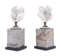 A Pair of Bisque Busts on Marble Bases