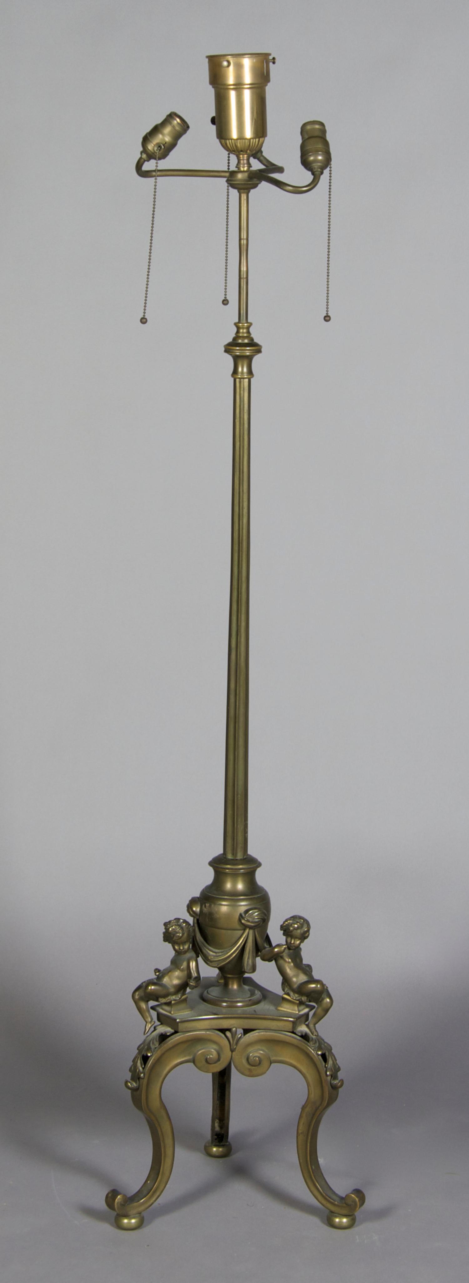 A Bronze Figural Floor Lamp, Height overall 64 1/2 inches.