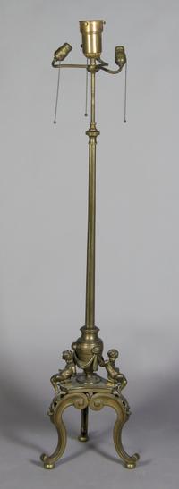 A Bronze Figural Floor Lamp, Height overall 64 1/2 inches.