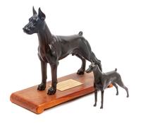 Two Doberman Figures Height of taller 15 1/4 inches.