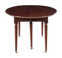 A French Brass Mounted Mahogany Drop-Leaf Dining Table