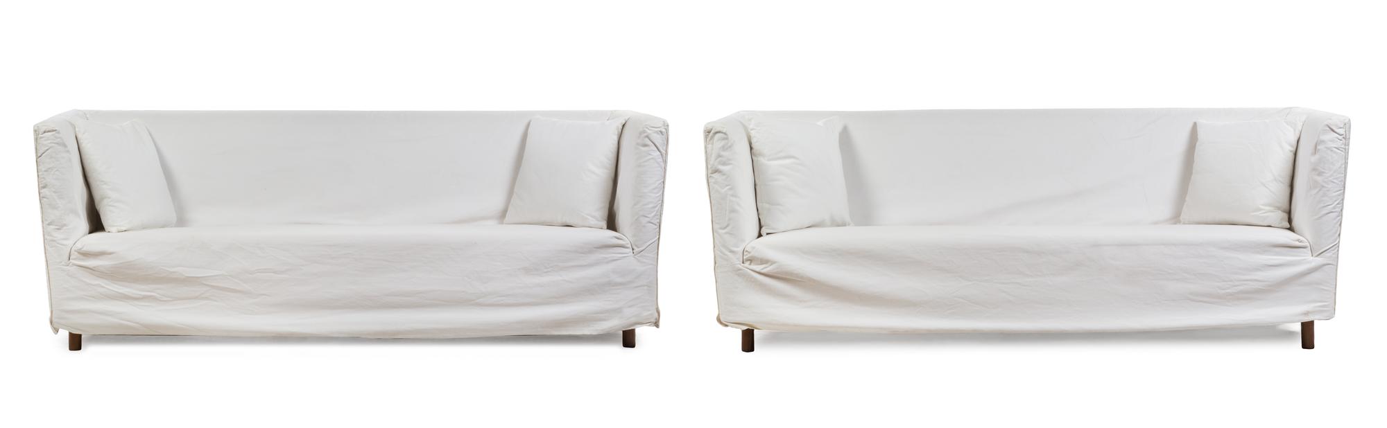 A Pair of Flexform Twill-Slipcovered Sofas Height 27 x width 82 x depth 30 inches.
